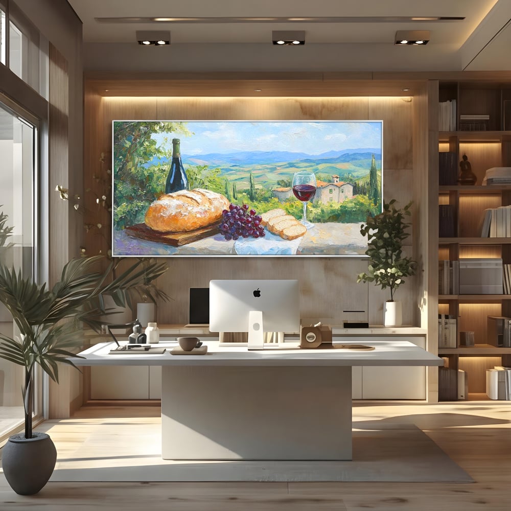 Tablou canvas cu tablou canvas cu natura moarta si peisaj toscan, in rama de aluminiu argintiu, pe perete intr-un birou